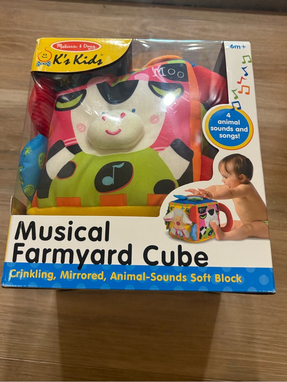 Melissa & Doug Musical Farmyard Cube - Pink, Green, Blue, Yellow